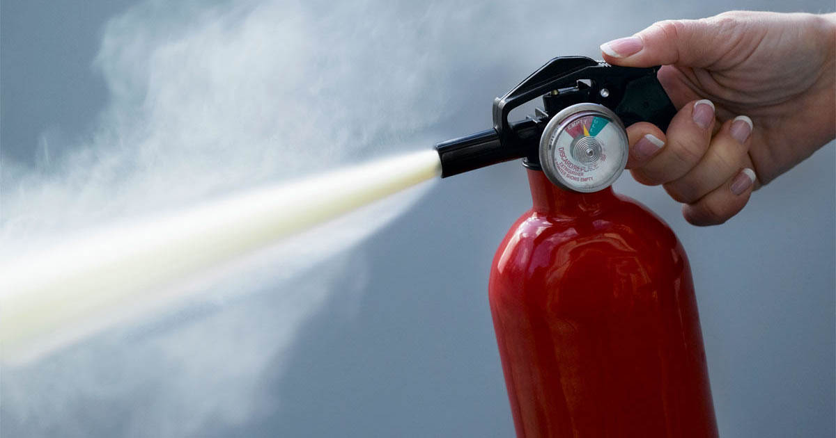 discharging fire extinguisher
