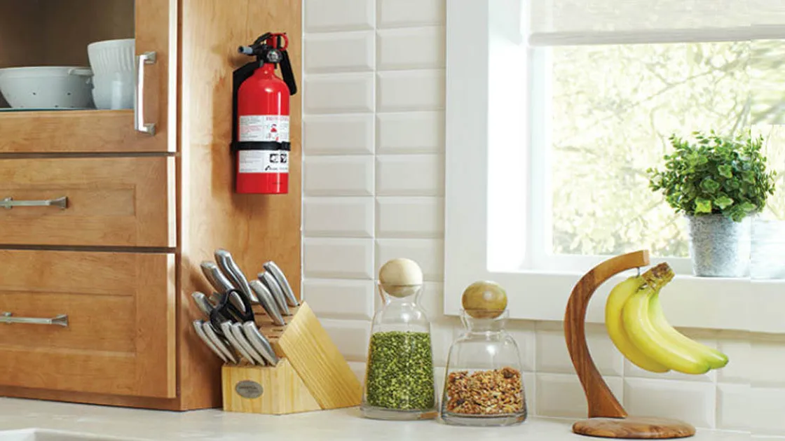 fire extinguisher hanging in kitchen