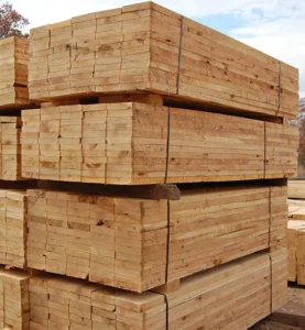 lumber stacked in a large pile