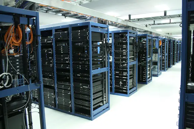 server room with stacks of electronic equipment - clean agent system needed