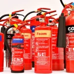 different types of fire extinguishers lined up