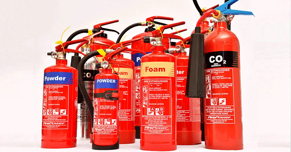 different types of fire extinguishers lined up